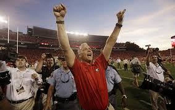 Coach Mark Richt celebrates after a big win over LSU in 2013. We won't talk about what happened afterward.